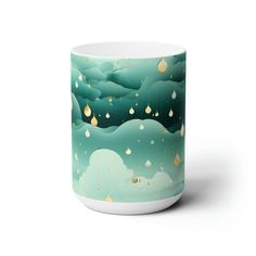 a coffee mug with rain drops on it, sitting in front of a white background