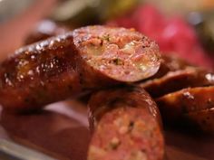 some sausages are on a plate and ready to be eaten