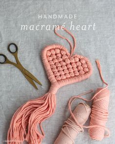 the yarn is being used to make a heart