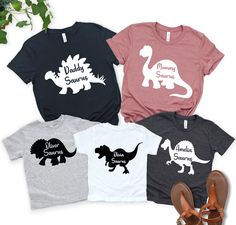 "Custom Dinosaur Shirt, Personalized Dinosaur Shirt, Dinosaur Family Shirt, Dinosaur Birthday Shirt, Personalized Shirt for Family, Personalized Saurus Tee, Kids Custom Dinosaur Shirt, Triceratops Shirt, Boys Birthday Party Dinosaur, Cute Dinosaur Shirt, Name Dinosaur Tee, Dinosaur GiftCustom Birthday Tees, Custom Saurus Shirt, Dinosaur Shirt, Premium Quality Printed in the USA. HOW TO ORDER T-SHIRT 1-) Please, Check and Review all Photos. 2-) Select Your T-shirt Color. 3-) Select Your T-shirt S Dinosaur Family, Dinosaur Tee, Custom Birthday Gifts, Dinosaur Shirt, Daughters Shirt, Family Shirts Matching, Baby Dinosaurs, Birthday Boy Shirts, Birthday Tshirts