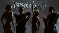 three women are standing in front of a sign with the word dancehall written on it