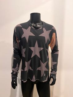 VINTAGE VIVIENNE WESTWOOD MAN Pirate Style Top in star patterned print The oversized and asymmetrical fit is what makes this special piece of fashion history so unique, also with extra long sleeves.  Two colour ways/print  front & back In good condition.  Made in Italy  Size 44. cotton stretch fabric Long Sleeve Tops With Star Print For Fall, Long Sleeve Star Print Tops For Fall, Long Sleeve Star Print Tops For Streetwear, Long Sleeve Tops With Star Print For Streetwear, Casual Long Sleeve Star Print Tops, Oversized Long Sleeve Tops With Star Print, Black Star Print Top For Winter, Relaxed Fit Star Print Top For Fall, Casual Long Sleeve Top With Star Patch