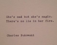 an old typewriter with the words she's mad but she's magic there's no lie in her fire