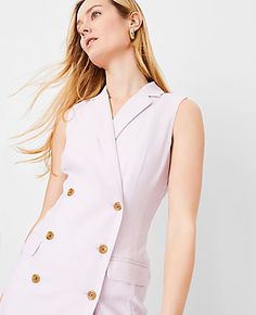 A feminine take on classic suiting, our double breasted sheath dress is tailored and timeless. Notched lapel. Sleeveless. Double breasted button front. Front flap besom pockets. Lined.,Imported:Imported,Length:22" from natural waist,Fabrication:Shell: 66% Polyester, 32% Viscose, 2% Spandex; Lining: 100% Polyester,Garment Care:Machine Washable Double Breasted Sheath Dress by Ann Taylor Size regular - 12 Lavender Cloud Women's Sheath, V-Neck, Sleeveless, Dresses, Shell 66%, Polyester, 32%, Viscose, 2%, Spandex Lining 100%, Polyester, Machine, Washable Knitted Suit, Sleeveless Dresses, Sheath Dress, Effortless Style, Ann Taylor, Double Breasted, Lavender, Size 12, Spandex