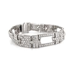 Contemporary style diamond platinum chain link bracelet with a touch of retro and vintage. Covered by round cut white diamonds 12.32 ct in total. Diamonds are all natural in G-H Color Clarity VS. Platinum 950. Width: 1.1 cm Height: 18.5 cm Weight: 37.51 g [shortcode] [video] [/video] [/shortcode] Luxury White Gold Chain Bracelet With Diamond Accents, White Gold Hoop Earrings, Diamond Chandelier, Platinum Bracelet, Platinum Chain, White Gold Hoops, Platinum Earrings, Colombian Emeralds, 18k Gold Jewelry