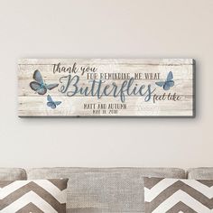 a wooden sign that says thank you for sending me what butterflies are flying on it