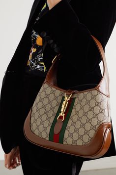 Beige Jackie 1961 small webbing-trimmed coated-canvas and leather shoulder bag | GUCCI | NET-A-PORTER Gucci 2022 Bags, Luxury Casual Brown Dress Shoes, Gucci Handbag Vintage, Gucci Side Purse, Replica Gucci Bag, Mini Gucci Shoulder Bag, Leather Bag Gucci, Gucci Gg Handbags, Gucci Classic Bags