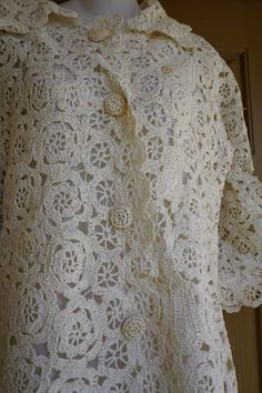 "Vintage 1970s crocheted jacket with full lining. No tags - estimated size M. In great vintage condition. Measurements taken across front laid flat 20\" armpit to armpit 19\" across waist 40\" length" Vintage Cream Crochet Top, Fitted White Crochet Outerwear, Vintage Cream Crochet Top With Trim, Vintage Crochet Outerwear For Spring, Vintage Cream Crochet Top With Crochet Trim, Spring Vintage Crochet Outerwear, Vintage White Crochet Top With Crochet Trim, White Vintage Crochet Top With Crochet Trim, Crocheted Jacket