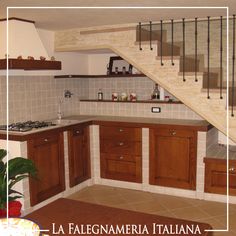 an image of a kitchen setting with stairs