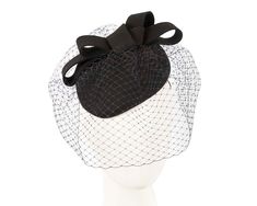 Classic black pointy pillbox base with addition of felt bow and face veil. Ideal choice for any sad or happy occasion.  Made in Australia  Pure felt  Elastic band for easy wear Elegant Black Mini Hats As Gifts, Black Cloche Mini Hat For Evening, Black Cloche Fascinator For Evening, Black Evening Cloche Fascinator, Adjustable Black Cloche Fascinator, Black Cloche Fascinator With Adjustable Fit, Elegant Black Hat As Gift, Black Hat With Bow And Curved Brim, Black Bow Fascinator For Formal Occasions