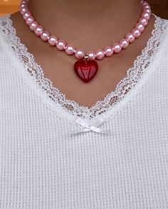 Super Glazed and Super glossy! This is our take on the classic pearl necklace -- choose between pink or elegant white glass pearls, and a cherry red heart or milky white heart charm! Both equally juicy, of course. Pink pearl option measures at around 15" long with extender, and white pearl option available in both 15" and 17" long with extender. Charm Necklace Diy, Diy Choker, Classic Pearl Necklace, Pink Choker, Lucky Charm Necklace, Bling Earrings, Baby Pearls, Initial Earrings, Long Pearl Necklaces