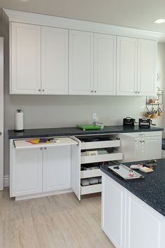 the kitchen is clean and ready to be used as a work space for some people