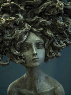 a statue with many hair on it's head