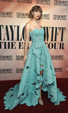 taylor swift in a strapless blue gown