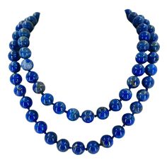 A 10.5mm Lapis Lazuli Beaded Necklace With No Clasp. The Necklace Measures 36 Inches Long. Lapis Lazuli Gemstone Beads Necklaces, Lapis Lazuli Necklaces With 8mm Beads, Luxury Lapis Lazuli Beaded Necklaces, Luxury Faceted Lapis Lazuli Necklaces, Blue Lapis Lazuli Necklace With Large Beads, Luxury Lapis Lazuli Faceted Beads Necklace, Lapis Lazuli Necklace, Lapis Lazuli Beads, Lapis Lazuli