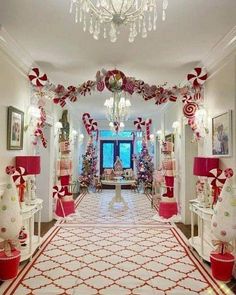 a hallway decorated with candy canes and christmas decorations