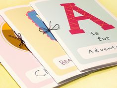 two children's books with letters and numbers on them