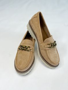 Treat your feet to luxury with our Corky's Camel Faux Suede Loafers. Made with premium wine suede and a chic matte gold chain, these shoes will elevate any outfit. Cheers to effortless elegance! Key Features: Camel Faux Suede Loafers Matte gold chain Corkys does not make half sizes, so if you are in between sizes, we recommend sizing up to the next whole size in order to ensure a proper fit. Luxury Elegant Gold Loafers, Elegant Luxury Gold Loafers, Luxury Suede Loafers For Women, Premium Wine, Suede Loafers, Effortless Elegance, Matte Gold, Faux Suede, Gold Chain