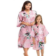 Stylish and trendy Mommy and Me Robes for women and girls These robes are great for any occasion, whether for daily use, travel, spa parties, wedding, vacation and more Kids love dressing up like mommy, and its a great opportunity to share something special with your daughter, niece, goddaughter, granddaughter, sister and more Available for women in regular or plus sizes, from sizes 2 to 38, and for child from 2T to 14. Please use our specific size chart to get a great fit Robes feature a floral Robes For Women, Plus Size Robes, Kids Robes, Couple Pajamas, Pyjamas Womens, Floral Robes, Short Kimono, Peacock Design, Womens Robes