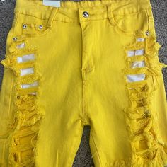 Distress Shorts Yellow Ripped Cotton Pants For Summer, Ripped Stretch Shorts For Spring, Stretch Ripped Shorts For Spring, Stretch Ripped Bottoms For Summer, Fitted Yellow Jeans For Summer, Yellow Wide Leg Jeans For Summer, Ripped Stretch Cotton Bottoms, Stretch Cotton Ripped Bottoms, Ripped Stretch Bottoms For Spring