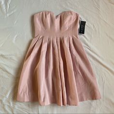 J Crew Wedding & Parties Strapless Dress Tagged Size 8. Measurements Are Included In Pictures. Features The Prettiest Blush Pink Color, Strapless Slightly Sweetheart Neckline, Mid-Length (I’m 5’3 And It’s Just Below My Knee, Double Check Measurements), Zipper For Easy On/Off, And It Has Pockets!!! New With Original Tags Attached. No Damage. No Obvious Defects. If You Have Any Questions Or Need More Detail Please Comment Below! Fitted Strapless Dress For Wedding Guest, Elegant Mini Dress With Lined Bodice For Bridesmaids, Wedding Sleeveless Mini Dress With Pleated Bodice, Sleeveless Mini Dress With Pleated Bodice For Wedding, Sleeveless Wedding Mini Dress With Pleated Bodice, Fitted Sweetheart Neckline Bridesmaid Dress, Elegant Mini Bridesmaid Dress With Lined Bodice, Fitted Pink A-line Strapless Dress, Pleated A-line Mini Dress For Bridesmaid