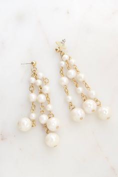 "Vintage Faux Pearl Tassel Earrings. Length: 3 1/8\" Total weight: 17.7 grams Good vintage condition! Back to the shop: https://www.etsy.com/shop/SusVintage?ref=hdr_shop_menu Don't hesitate to contact me if you have any further questions. Thank you for looking!!" White Dangle Earrings With Pearl Chain, Pearl White Dangle Bridal Earrings, White Dangle Bridal Earrings With Pearl Charm, White Dangle Bridal Earrings With Pearl Chain, Pearl Dangle Earrings With Beads, Pearl Dangle Earrings With Dangling Beads, Pearl Chandelier Earrings For Pierced Ears, White Earrings With Dangling Beads For Celebration, White Pearl Chain Earrings With Round Beads