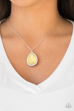 Featuring an iridescent finish, a dramatic yellow teardrop gem is pressed into a shimmery silver frame radiating with glassy white rhinestones. The glamorous pendant swings from the bottom of a dainty silver chain below the collar for a timeless finish. Features an adjustable clasp closure. Sold as one individual necklace. Includes one pair of matching earrings. P2RE-YWXX-066XX Paparazzi Accessories Jewelry, Yellow Necklace, Yellow Jewelry, Paparazzi Accessories, White Rhinestone, Silver Engagement Rings, Affordable Jewelry, Blue Necklace, Rhinestone Necklace