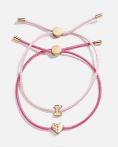 Give your mini the best of both worlds when you scoop up this two-in-one, super stackable bracelet set. The Kids' Cord Initial Bracelet Set will feature the initial of your choosing crafted in crystals and gold and sitting on a pink cord. We paired each initial with a matching heart bracelet, ensuring your little's bracelet stack will be extra meaningful. Please note: intended for children 3+. Matching Heart Bracelet, Anchor Bracelet, Kids Bracelets, 20 Off Sale, Jewelry Accessories Ideas, Baby Jewelry, Prime Time, Initial Bracelet, Stackable Bracelets