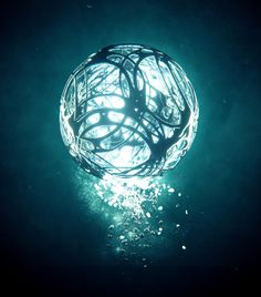 a light ball floating on top of water