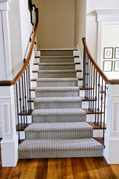 the stairs in this house are lined with carpet