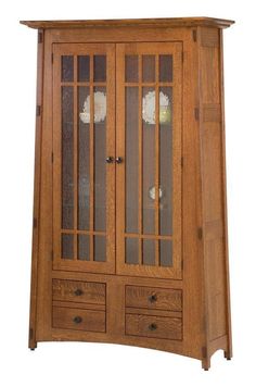 a wooden cabinet with glass doors and drawers