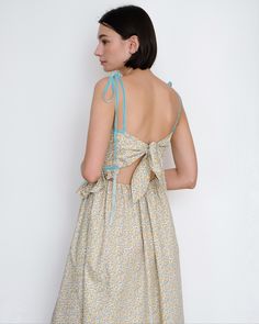 ONLY 1 LEFT IN STOCK A tender, romantic dress in a floral print with blue velvet ribbons. From Montreal based designer, Eliza Faulkner. Through her namesake line, Eliza has created a range of contemporary apparel offering a bold, feminine take on ethical and sustainable fashion. Adjustable ties and elastic, slant pockets. Fits true to size FINAL SALE Composition: 100% Cotton Measurements: Size XS: 32"-34" Bust, 24"-26" Waist, 34-36" Hips Size S: 34"-36" Bust, 26"-28" Waist, 36"-38" Hips Size M: Eliza Faulkner, Blue Velvet Ribbon, Dress Trims, Diy Fashion Clothing, Daisy Dukes, Romantic Dress, Velvet Ribbon, Fit Check, Blue Velvet