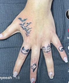 a woman's hand with two different tattoos on it