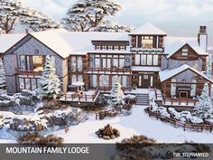 the mountain family lodge is surrounded by snow covered trees