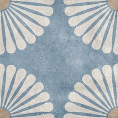 an abstract blue and white design with scallop shells on it's sides