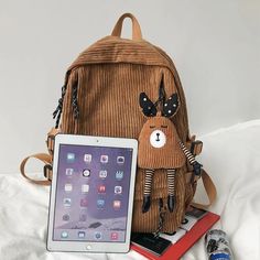 This multi-function backpack is made from premium-grade corduroy material with an excellently adorable design. This bag from Innovato Design is perfect for both school and travel, combining versatile features and trendy design. It blends style with utility and offers multiple compartments for organized storage. Made from high-quality corduroy fabric, it's not only stylish but also durable. Padded shoulder straps ensure comfort. Use it for school, work, or travel – this backpack suits various occasions and keeps your essentials secure with reliable zippers.   Product highlights:   Made from premium-grade materials  Available in 3 fascinating colors   Bag dimension: Long:30cm/11.81inch; Width:13cm/5.1inch; High:42cm/16.53inch  Features: Front: 3 Zipper Pocket Back: 1 Zipper Pocket Inside: 1 Casual Corduroy School Backpack, Corduroy Travel Bag For Back To School, Corduroy Backpack For Daily Use And Back To School, Back To School Corduroy Backpack For Daily Use, Back To School Corduroy Backpack, Back To School Corduroy Bags, Corduroy Backpack For Back To School, Corduroy Standard Backpack For Back To School, Corduroy Backpack