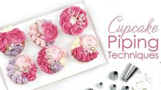 cupcake piping techniques are displayed on a white tray with pink and purple flowers