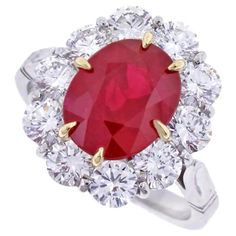 For Sale on 1stDibs - From the master ring makers of Pampillonia. an oval Burma ruby surrounded by diamonds. The ruby is a pure red color with no overtones ♦ Designer: Pampillonia Most Expensive Jewelry, Burmese Ruby, Ruby And Diamond Ring, Ruby Diamond Rings, Royal Jewels, Expensive Jewelry, Ruby Jewelry, Ruby Diamond, Ruby Ring