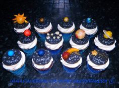 cupcakes decorated with solar system and planets