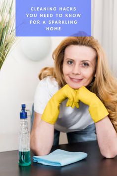 a woman with yellow gloves and cleaning products on her desk in front of a blue sign that says, cleaning hacks you need to know for a sparkling home