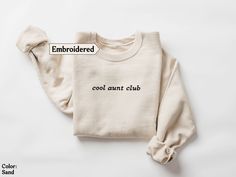 Chill out in style with our pink "Cool aunt club" embroidered sweatshirt! This comfy top celebrates your cool aunt status with flair. With fun embroidery reflecting your awesome aunt vibes, this sweatshirt is perfect for hanging out and making memories. Treat yourself to this cozy delight--it's a must-have for your wardrobe, showing off your cool aunt vibes!  Why you will love our sweatshirts  At Happy Gift Market, we pride ourselves on offering high-quality products that are both trendy and fun Aunt Vibes, Cool Aunt Club, Homebody Club, Fun Embroidery, Aunt Sweatshirt, Cool Aunt, New Aunt, Womens Sweatshirts, Best Aunt