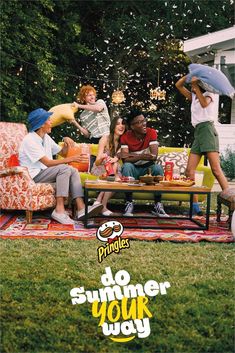 a group of people sitting around a picnic table