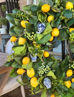 a wreath with lemons and green leaves