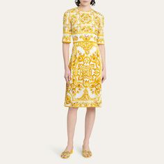 Dolce&Gabbana printed charmeuse dress Round neckline Elbow-length sleeves Side seam pockets A-line silhouette Knee length Back zip Silk/spandex Made in Italy Luxury Silk Sheath Dress, Luxury Fitted A-line Midi Dress, Designer Silk Dress With Floral Print, Designer Silk Floral Print Dress, Luxury Floral Print Summer Dress, Luxury Midi Length Daywear Dresses, Elegant Printed Short Sleeve Midi Dress, Elegant Short Sleeve Printed Midi Dress, Elegant Printed Short Sleeve Dresses