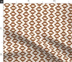 a brown and white checkered fabric with an area for the ruler to be displayed