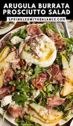 a salad with hard boiled eggs, prosciutto and arugula