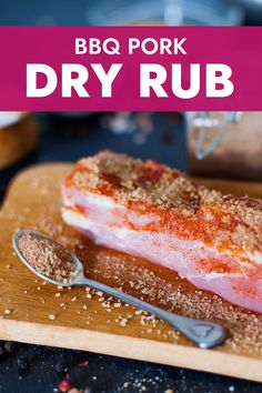 bbq pork dry rub on a wooden cutting board with spoons and seasoning