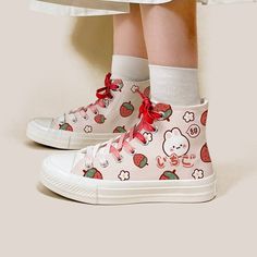 **Prevent me from ending up in a landfill! Shop open box and save up to 60% OFF** Features: Bring the cute to your outfit in these super adorable Kawaii Strawberry Bunny High-Top Canvas Shoes. These shoes are great for giving your casual wear that extra pop of kawaii personality. They make a great gift for anyone who loves adorable things, and are sure to be a hit! Made with high-quality canvas material to be both durable and comfortable to wear. The outsole material is made with rubber, giving Bunny Canvas, Strawberry Bunny, Kawaii Strawberry, Dr Shoes, Kawaii Shoes, Cute Sneakers, Cute Strawberry, Rabbit Cartoon, Canvas Shoes Women