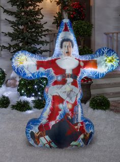 a christmas decoration in front of a house