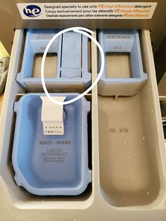 an open box with two compartments containing water and soap